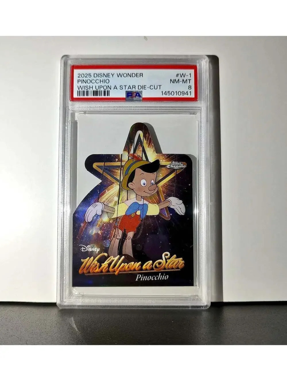 Pinocchio 2025 Topps Chrome Disney #W-1 Wish Upon A Star Die Cut Pinocchio PSA 8